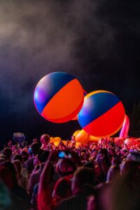 A crowd of people at a music festival
